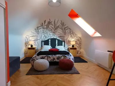 Un ou plusieurs lits dans un hébergement de l'établissement Apartment Chez Cathy by Interhome