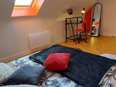 Un ou plusieurs lits dans un hébergement de l'établissement Apartment Chez Cathy by Interhome