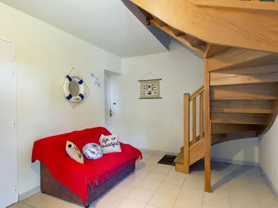 Un ou plusieurs lits dans un hébergement de l'établissement Studio Studio coquet by Interhome
