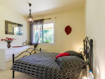Un ou plusieurs lits dans un hébergement de l'établissement Apartment Chez Yvette by Interhome