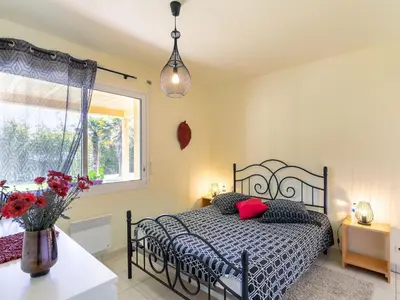 Un ou plusieurs lits dans un hébergement de l'établissement Apartment Chez Yvette by Interhome