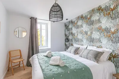Un ou plusieurs lits dans un hébergement de l'établissement Sieck - Joli Appartement Vue mer