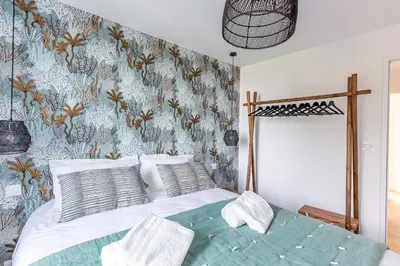 Un ou plusieurs lits dans un hébergement de l'établissement Sieck - Joli Appartement Vue mer