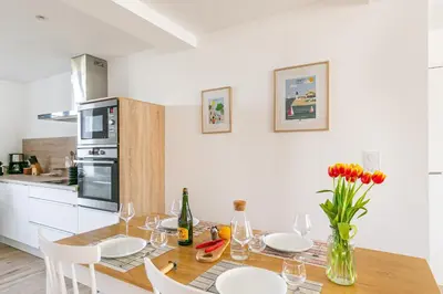 Cuisine ou kitchenette dans l'établissement Callot