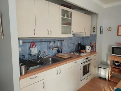 Cuisine ou kitchenette dans l'établissement Studio lumineux proche port & plages