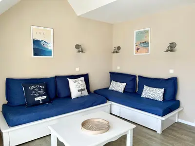 Coin salon dans l'établissement Appartement en duplex front de mer, Cap Coz