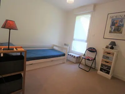 Un ou plusieurs lits dans un hébergement de l'établissement Triplex cosy à Bénodet : Terrasse, Jardin, Plage et Thalasso à 200m ! - FR-1-481-104