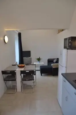 Cuisine ou kitchenette dans l'établissement Ty cocooning