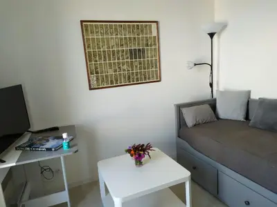 Télévision ou salle de divertissement dans l'établissement Ty cocooning