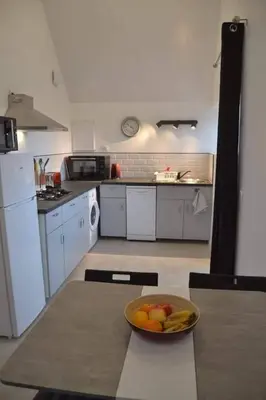 Cuisine ou kitchenette dans l'établissement Ty cocooning