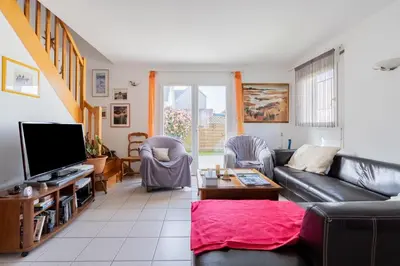 Télévision ou salle de divertissement dans l'établissement Ty Yann