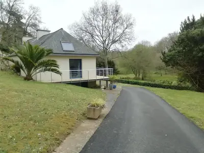 Jardin de l'établissement La maison au bord de l'eau