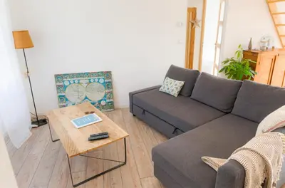 Coin salon dans l'établissement Vacances en famille a 250m de la mer a Penmarch