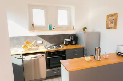 Cuisine ou kitchenette dans l'établissement Vacances en famille a 250m de la mer a Penmarch