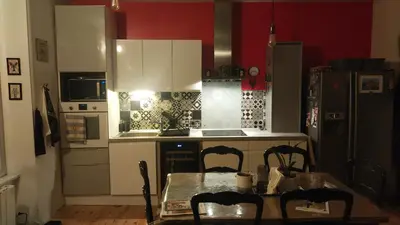 Cuisine ou kitchenette dans l'établissement Chambrecosy proche gare et centre historique