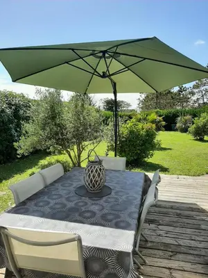 Jardin de l'établissement Maison Chaleureuse Bord de Mer