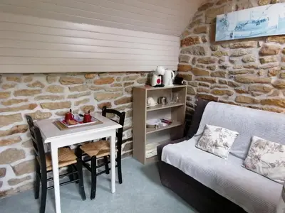 Coin salon dans l'établissement Gîtes de Lohantec à 30 min de la Pointe du Raz