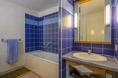 Salle de bains dans l'établissement Le Galet