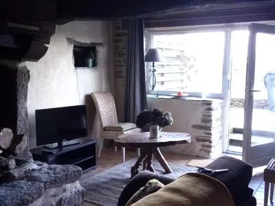 Coin salon dans l'établissement Petite maison dans les Monts d'Arrée TY COZ