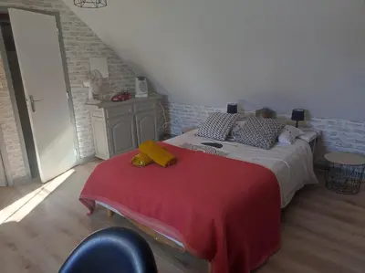 Un ou plusieurs lits dans un hébergement de l'établissement Chambre chez l'habitant 