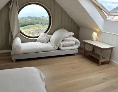 Un ou plusieurs lits dans un hébergement de l'établissement Dernier Ecolodge avant NewYork