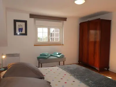 Un ou plusieurs lits dans un hébergement de l'établissement Holiday Home Ty Bihan by Interhome