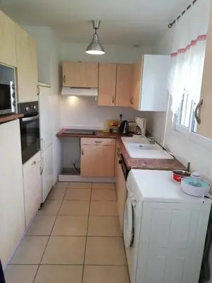 Cuisine ou kitchenette dans l'établissement Maison bord de mer