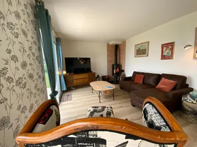 Télévision ou salle de divertissement dans l'établissement Magnifique Maison face à l'Océan - Pointe du RAZ