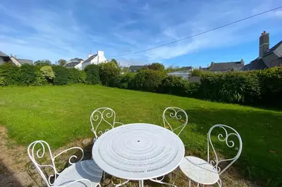 Jardin de l'établissement CARANTEC MAISON FAMILIALE AVEC JARDIN 9 personnes
