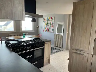 Cuisine ou kitchenette dans l'établissement La Bidouric, Jacuzzi