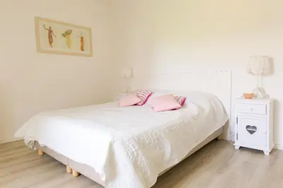 Un ou plusieurs lits dans un hébergement de l'établissement Charmante maison pour 7 à Tréguennec