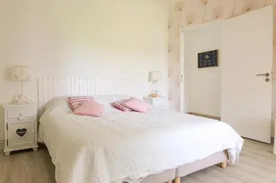 Un ou plusieurs lits dans un hébergement de l'établissement Charmante maison pour 7 à Tréguennec