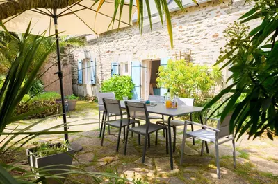 Jardin de l'établissement Charmante maison pour 7 à Tréguennec