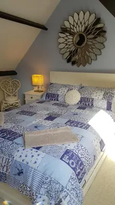 Un ou plusieurs lits dans un hébergement de l'établissement Maroux Vian Country Cottage
