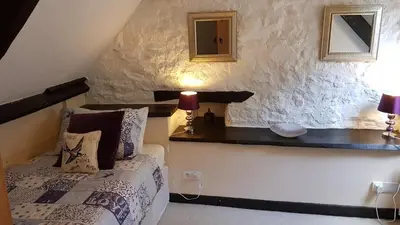 Un ou plusieurs lits dans un hébergement de l'établissement Maroux Vian Country Cottage