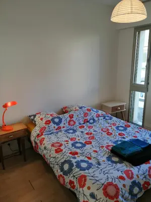 Un ou plusieurs lits dans un hébergement de l'établissement Appartement T3 vue sur rivière, 2 chambres 65M2