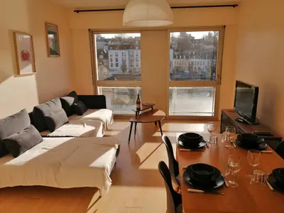 Coin salon dans l'établissement Appartement T3 vue sur rivière, 2 chambres 65M2