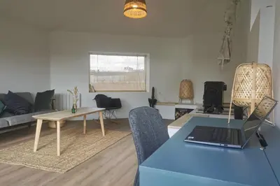 Coin salon dans l'établissement Maison cocooning vue mer à Barnenez