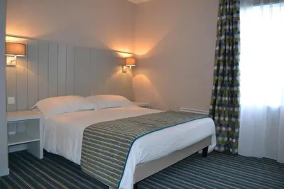 Un ou plusieurs lits dans un hébergement de l'établissement Residence Thalasso Concarneau