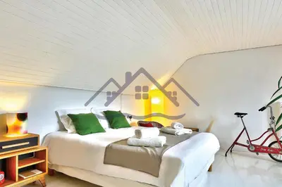 Un ou plusieurs lits dans un hébergement de l'établissement LocaLise - M20 - La maison des Dunes à 2 pas du centre - Tout à pied, plage, port, centre, commerces marché - Wifi inclus - Linge de lit inclus - Animaux bienvenus