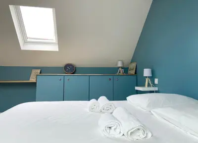 Un ou plusieurs lits dans un hébergement de l'établissement Charmante maison au Port de Sainte Marine