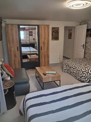 Un ou plusieurs lits dans un hébergement de l'établissement Appartement au calme proche d'un petit bois dans quimper