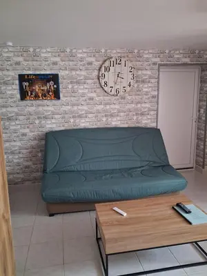 Coin salon dans l'établissement Appartement au calme proche d'un petit bois dans quimper