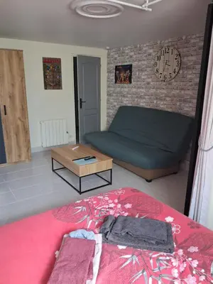 Coin salon dans l'établissement Appartement au calme proche d'un petit bois dans quimper