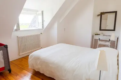 Un ou plusieurs lits dans un hébergement de l'établissement Treffiagat - Grande maison pour 9 - Jardin