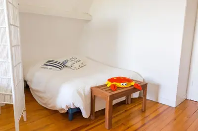 Un ou plusieurs lits dans un hébergement de l'établissement Treffiagat - Grande maison pour 9 - Jardin