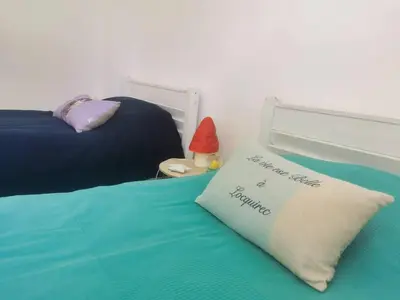 Un ou plusieurs lits dans un hébergement de l'établissement Ti Laouen - maison cocooning vue mer