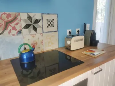 Cuisine ou kitchenette dans l'établissement Ti Laouen - maison cocooning vue mer