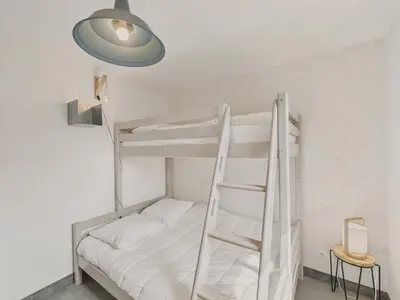 Un ou plusieurs lits dans un hébergement de l'établissement Charmante maison pour 5 au coeur de Penmarch