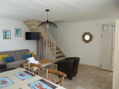 Coin salon dans l'établissement Maison de vacances 3* à 50m de la plage